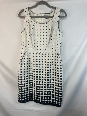 Tahari polka dot sheath dress wit a defined waist and full lining. Very classy!